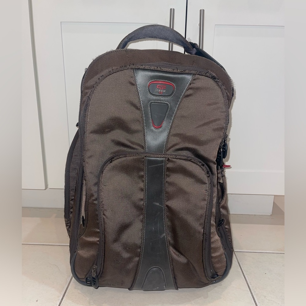 Tumi T-tech carry-on rolling backpack